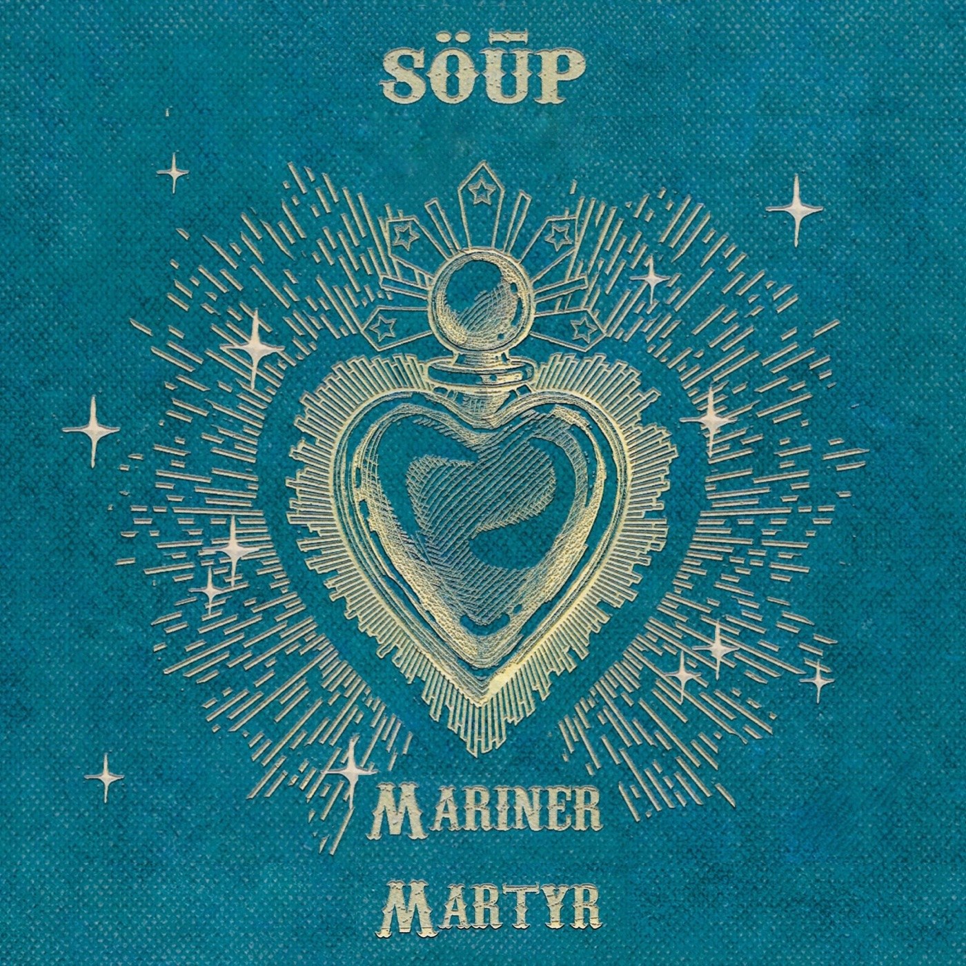 Mariner Martyr cover — a gold engraved sacred heart throwing off rays, on verdigris cloth
